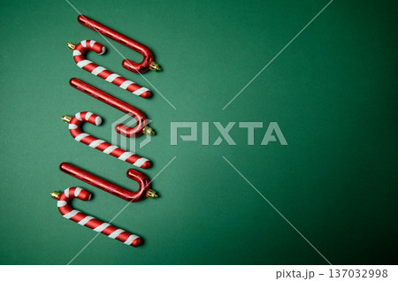 Festive Christmas Baubles on Emerald Green Background 137032998