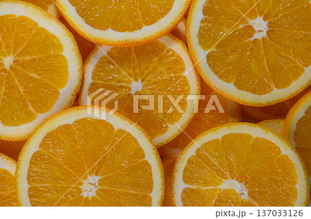 Fresh Orange Slices on Rustic Table Background Fresh Orange Slices on Rustic Table Background 137033126