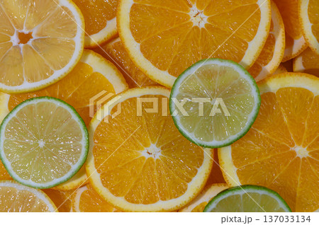 Orange and Lime Wedges Geometric Food Background Orange and Lime Wedges Geometric Food Background 137033134