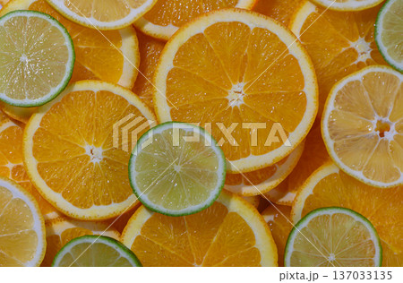 Sliced Orange and Lime Colorful Food Background Sliced Orange and Lime Colorful Food Background 137033135