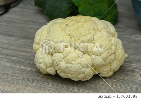 Cauliflower Head on a Kitchen Table 137033398