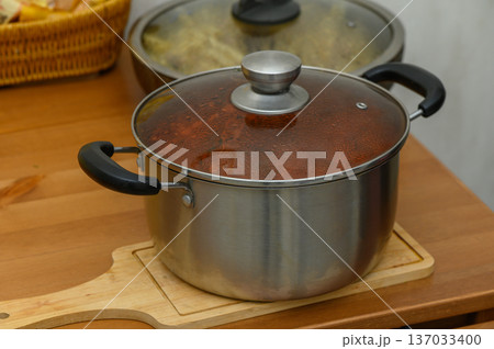 Pots with Ready-Made Food on a Dining Table Pots with Ready-Made Food on a Dining Table 137033400