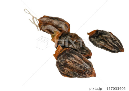 Rustic Dried Persimmons on Clean White Background 137033403