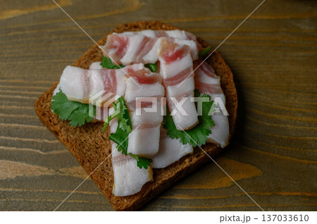 Black Bread with Salo on Old Wooden Table Black Bread with Salo on Old Wooden Table 137033610