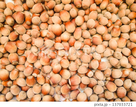 The brown Nuts background and texture. The brown Nuts background and texture. 137033721