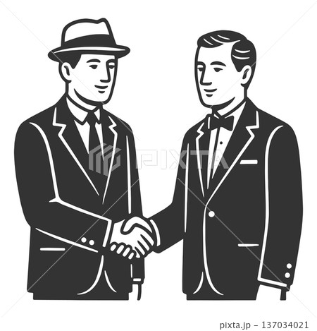 Two Businessmen Shaking Hands in Agreement 137034021