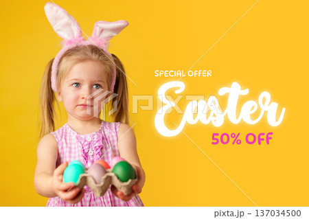Girl in bunny ears holds colorful eggs for Easter sale in simple setting with bright background Girl in bunny ears holds colorful eggs for Easter sale in simple setting with bright background 137034500
