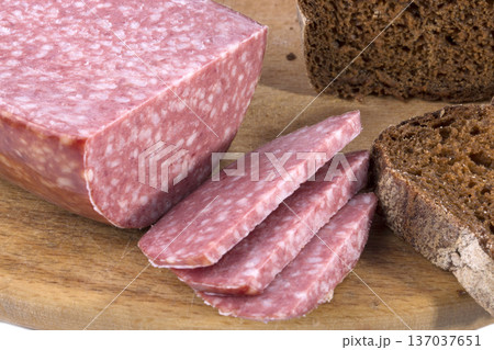 Close-up of bread and sausage on a table 137037651