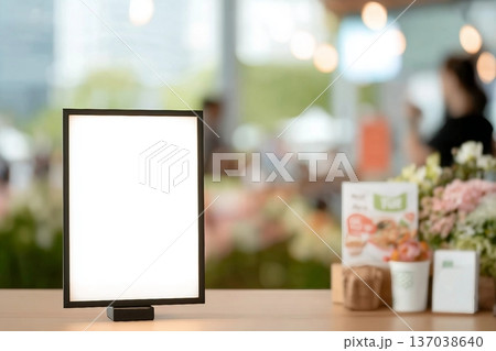 mockup white poster with black frame stand in front of blur restaurant cafe background for show or present promotion product concept mockup white poster with black frame stand in front of blur restaurant cafe background for show or present promotion product concept 137038640
