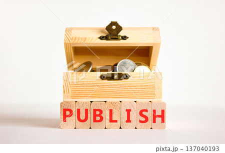 Publish word symbol. Concept word Publish on beautiful wooden blocks. Beautiful white background. Beautiful wooden chest with coins. Business publish word concept. Copy space. Publish word symbol. Concept word Publish on beautiful wooden blocks. Beautiful white background. Beautiful wooden chest with coins. Business publish word concept. Copy space. 137040193