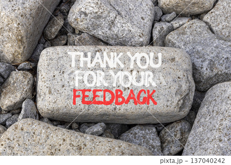 Thank you for your feedback symbol. Concept words Thank you for your feedback on beautiful grey stone. Beautiful grey stones background. Business thank you for your feedback concept. Copy space. 137040242