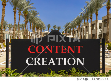 Time for content creation symbol. Concept words Content creation on beautiful big black road sign. Beautiful blue sky palm trees background. Business time for content creation concept. Copy space. Time for content creation symbol. Concept words Content creation on beautiful big black road sign. Beautiful blue sky palm trees background. Business time for content creation concept. Copy space. 137040243