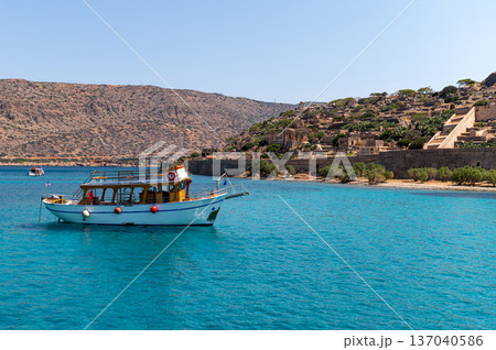 Explore Spinalonga Island rich history and stunning views from the crystal-clear waters 137040586