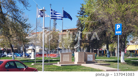 The city's central square with a monument and national flag. The city's central square with a monument and national flag. 137041083
