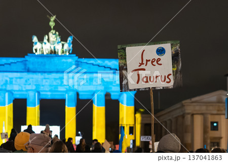 Free Taurus Sign Raised at Brandenburg Gate Lit Blue and Yellow in Berlin Free Taurus Sign Raised at Brandenburg Gate Lit Blue and Yellow in Berlin 137041863