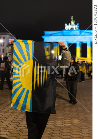 Donetsk Oblast Flag Raised in Front of Brandenburg Gate Lit Blue and Yellow Donetsk Oblast Flag Raised in Front of Brandenburg Gate Lit Blue and Yellow 137041873