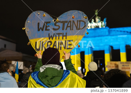 Heart-Shaped We Stand With Ukraine Sign in Front of Brandenburg Gate Heart-Shaped We Stand With Ukraine Sign in Front of Brandenburg Gate 137041899
