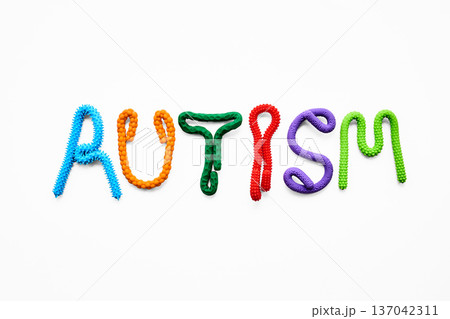 Autism word forming with colorful sensory toys 137042311