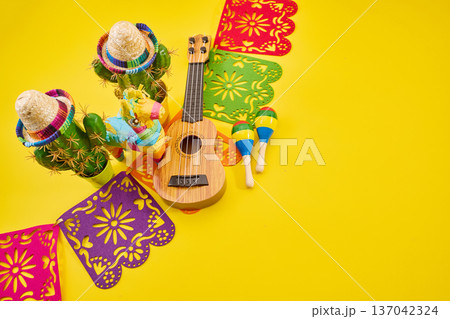 Mexican fiesta celebration with colorful cultural objects Mexican fiesta celebration with colorful cultural objects 137042324