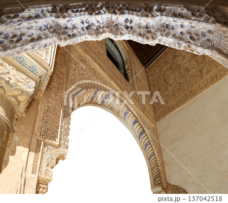 Arches in Islamic (Moorish) style (carved on white background) in Alhambra, Granada, Spain Arches in Islamic (Moorish) style (carved on white background) in Alhambra, Granada, Spain 137042518