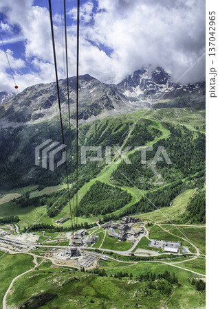 Ascending Schnalstal Glacier by cable car in the Italian Alps 137042965