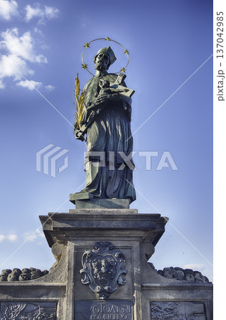 Statue of John of Nepomuk standing on Charles Bridge, Prague 137042985