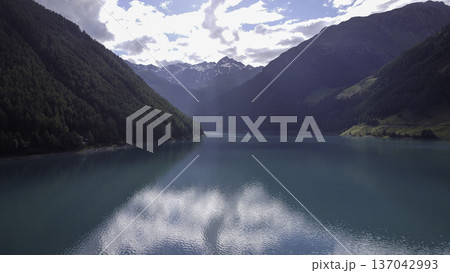 Lake Vernago reflecting the blue sky, Trentino Alto Adige, Italy Lake Vernago reflecting the blue sky, Trentino Alto Adige, Italy 137042993