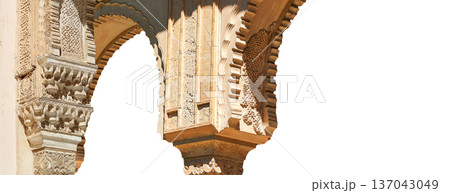 Arches in Islamic (Moorish) style (carved on white background) in Alhambra, Granada, Spain 137043049