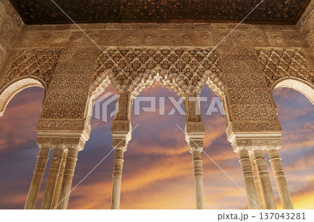 Arches in Islamic (Moorish) style (against the sunset) in Alhambra, Granada, Spain Arches in Islamic (Moorish) style (against the sunset) in Alhambra, Granada, Spain 137043281