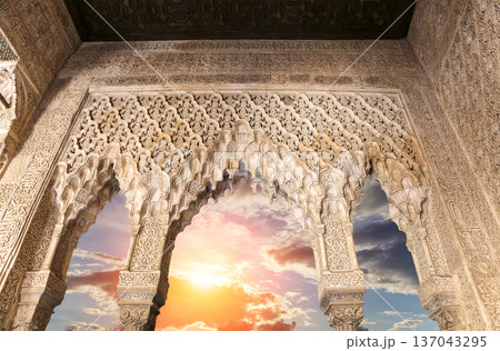 Arches in Islamic (Moorish) style (against the sunset) in Alhambra, Granada, Spain Arches in Islamic (Moorish) style (against the sunset) in Alhambra, Granada, Spain 137043295