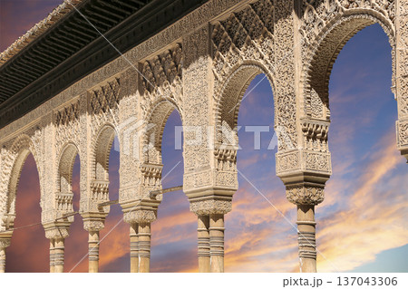 Arches in Islamic (Moorish) style (against the sunset) in Alhambra, Granada, Spain Arches in Islamic (Moorish) style (against the sunset) in Alhambra, Granada, Spain 137043306