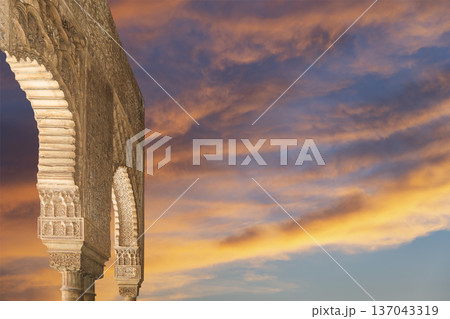 Arches in Islamic (Moorish) style (against the sunset) in Alhambra, Granada, Spain Arches in Islamic (Moorish) style (against the sunset) in Alhambra, Granada, Spain 137043319