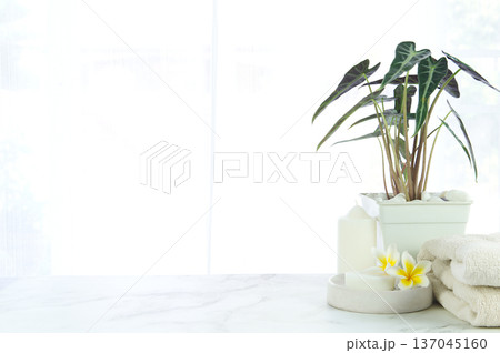 Minimal style soap holder and towel on a luxury stone marble tabletop 137045160