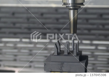 High precision CNC milling of a graphite electrode using a solid carbide ball nose end mill for EDM mold making applications. 137045306
