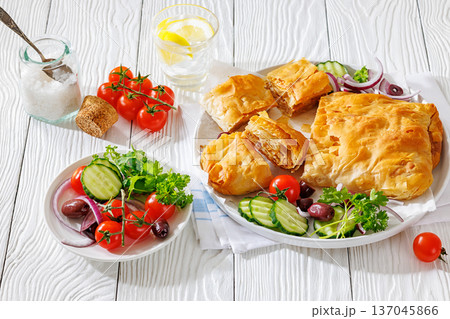 Sliced savory greek meat bougatsa of crispy phyllo pastry 137045866