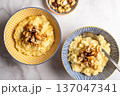 Millet porridge with mixed nuts 137047341