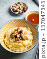 Millet porridge with mixed nuts 137047343