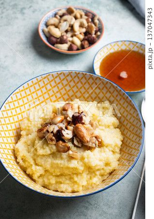 Millet porridge with mixed nuts Millet porridge with mixed nuts 137047343