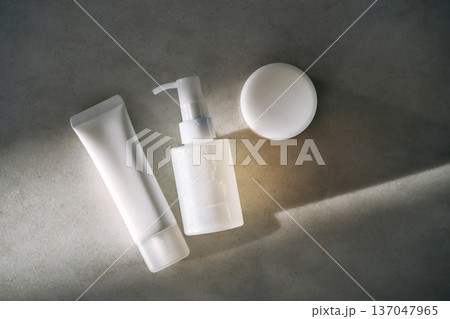 Skincare products, pump bottle, tube, and cream jar Skincare products, pump bottle, tube, and cream jar 137047965