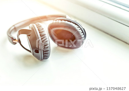 headphones empty window sill. place for text headphones empty window sill. place for text 137048627
