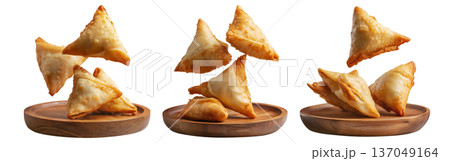 Set of Briouat triangular fruit filled pastries, phyllo pastries filled with meat or almonds on white, Arabic sweet desserts Set of Briouat triangular fruit filled pastries, phyllo pastries filled with meat or almonds on white, Arabic sweet desserts 137049164