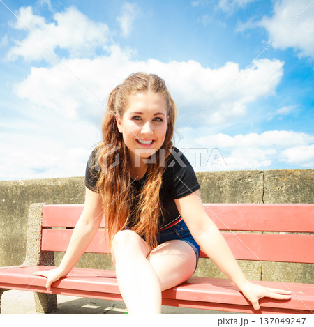 Happy teenager woman outside. 137049247