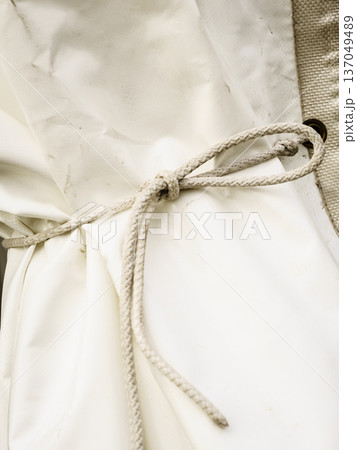 White tarp, waterproof tarpaulin detail White tarp, waterproof tarpaulin detail 137049489