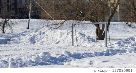 Outdoor football pitch covered with snow Outdoor football pitch covered with snow 137050991