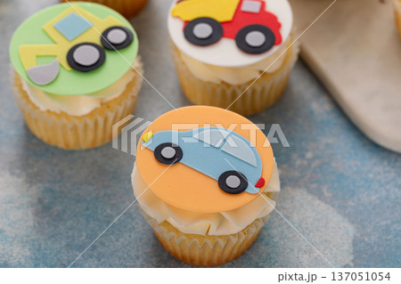 Cupcakes for a boy birthday or a baby shower with trucks and transport theme 137051054