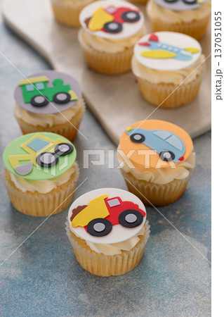 Cupcakes for a boy birthday or a baby shower with trucks and transport theme 137051055