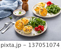 Egg bites with bacon and cheddar cheese, healthy breakfast meal prep idea 137051074
