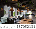 Modern restaurant interior with wooden tables and cozy seating near panoramic windows 137052131
