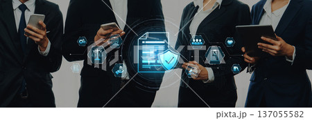 Business professionals using technology, focusing on legal documents and cybersecurity in a modern office environment with digital icons and secure data concepts Trope Business professionals using technology, focusing on legal documents and cybersecurity in a modern office environment with digital icons and secure data concepts Trope 137055582