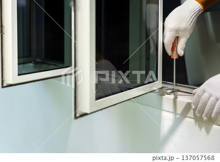 Handyman replace casement window stay friction. 137057568